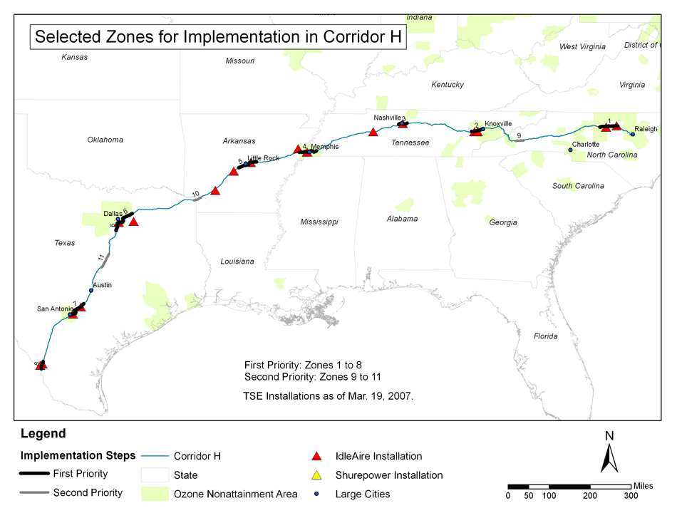 Map; title: 'Identified Zones in Corridor H'; shows first and second priority zones in the Laredo to Raleigh corridor with visual representation of the ozone non-attainment area(s), the large cities, and the current electrified truck stops.